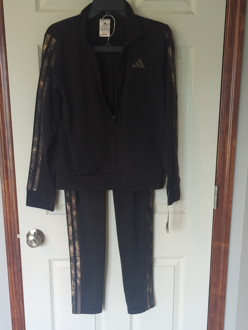 adidas Black Apparel with White Tag Detailing